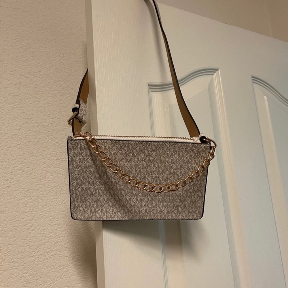Authentic Michael Kors waist bag in white color